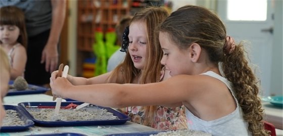 two young girls at a table