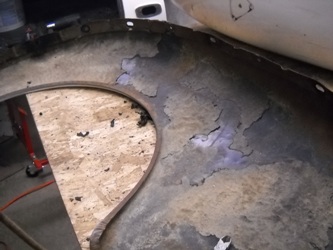 Rust on the back of a body panel.