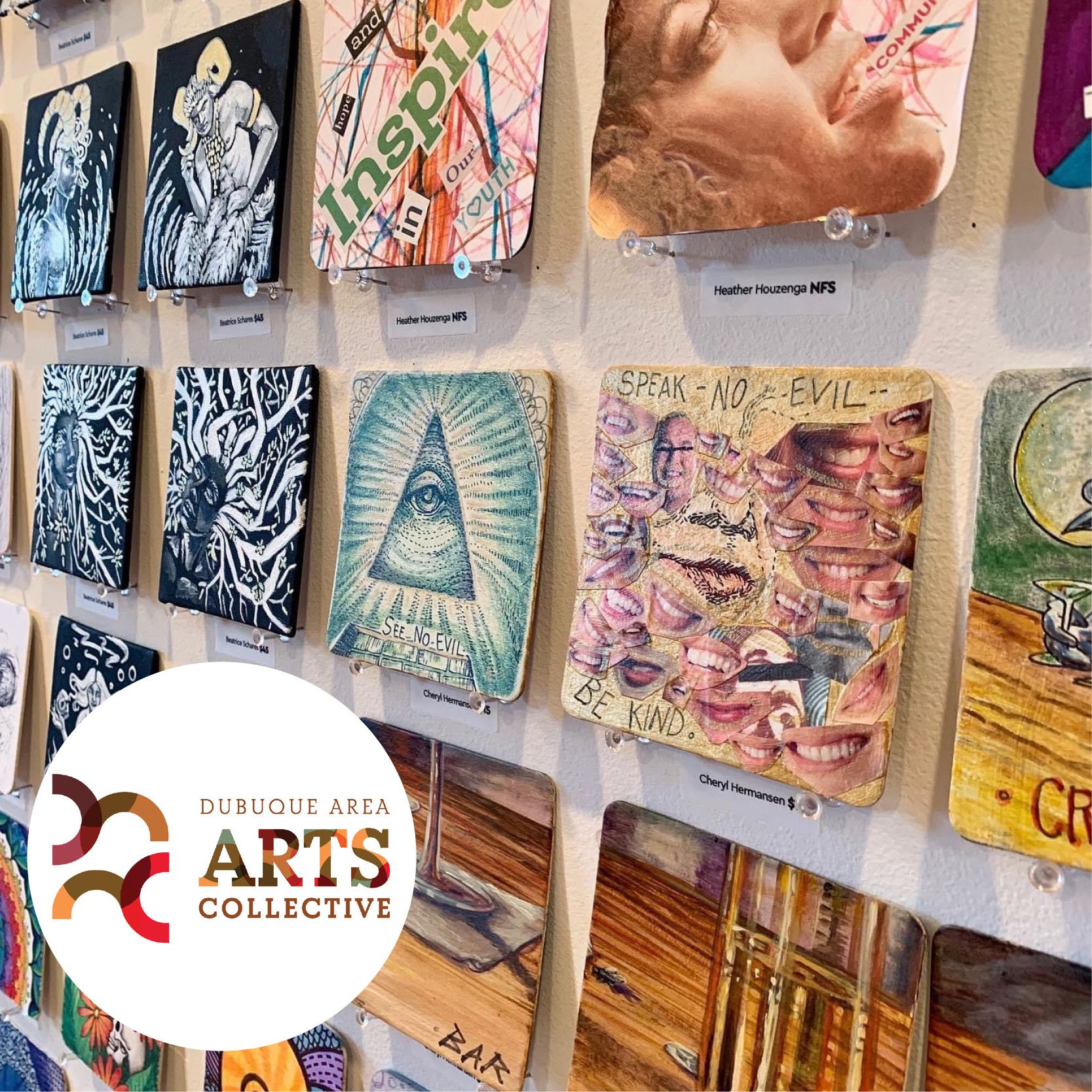 rows of small square works of art on a wall