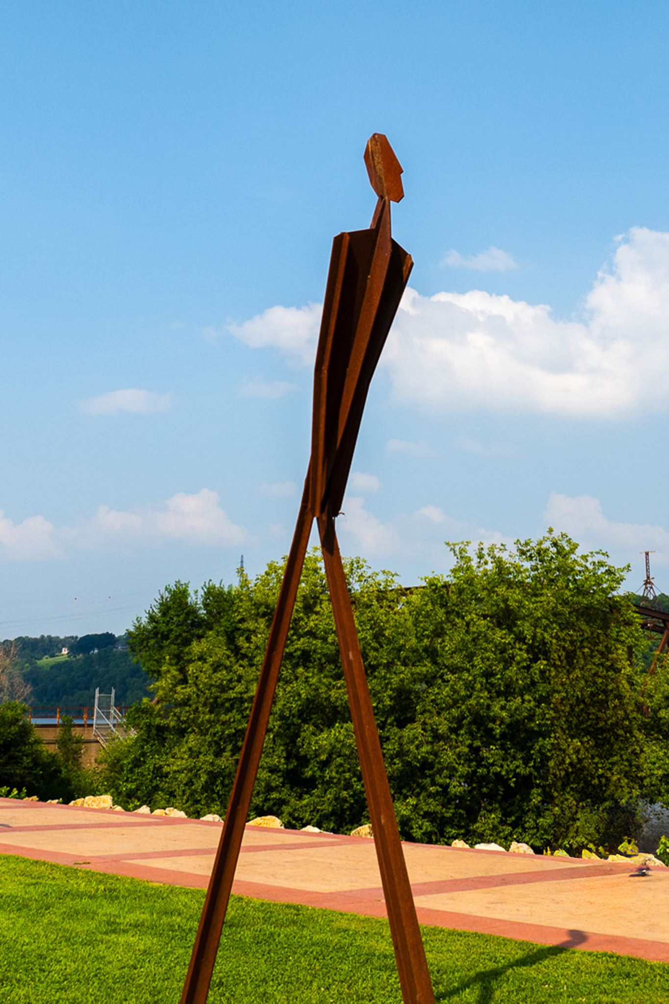 sculpture of a human walking